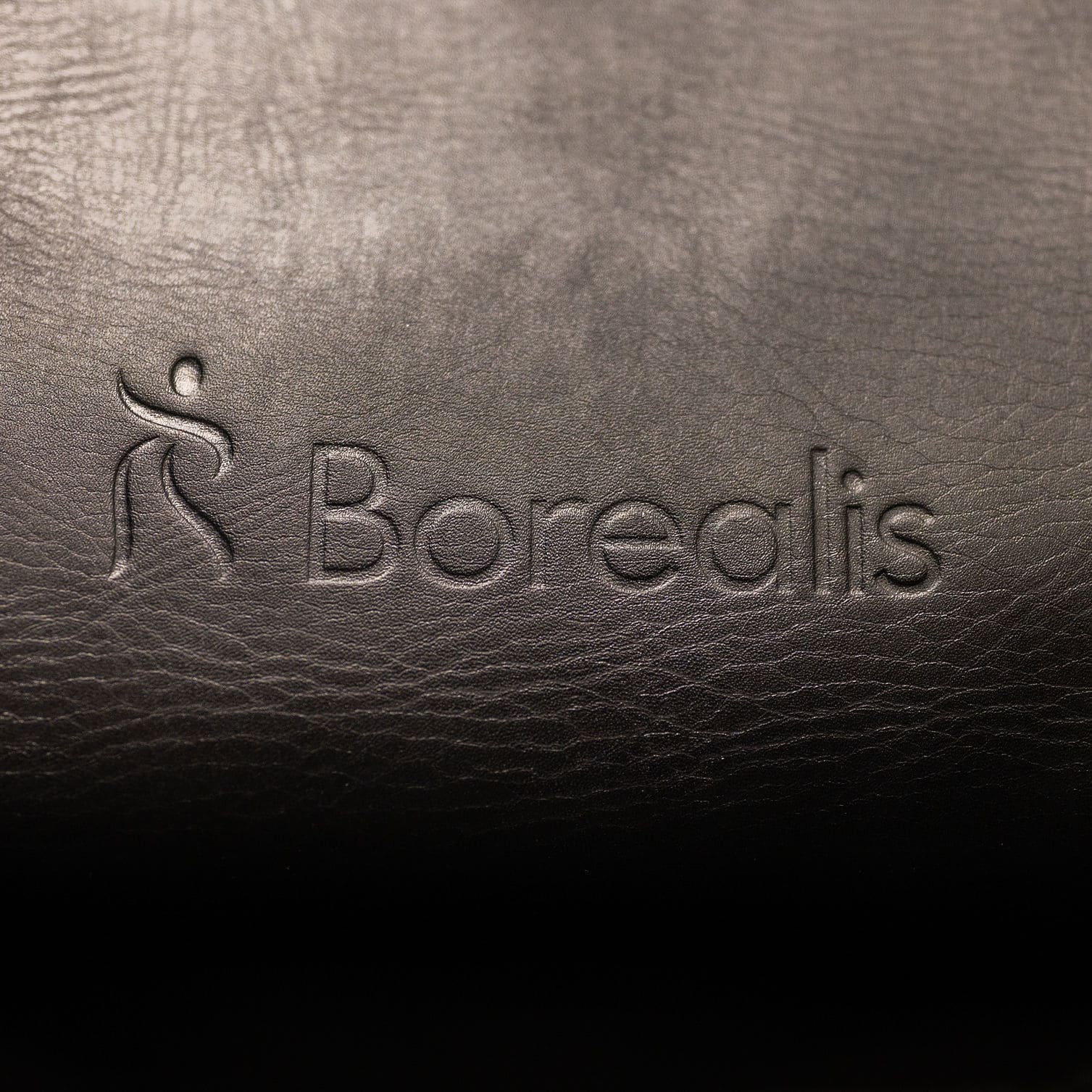 Borealis Ultra Plus 3D kvaliteetse musta naha tekstuuri lähivaade, pehme ja vastupidav materjal